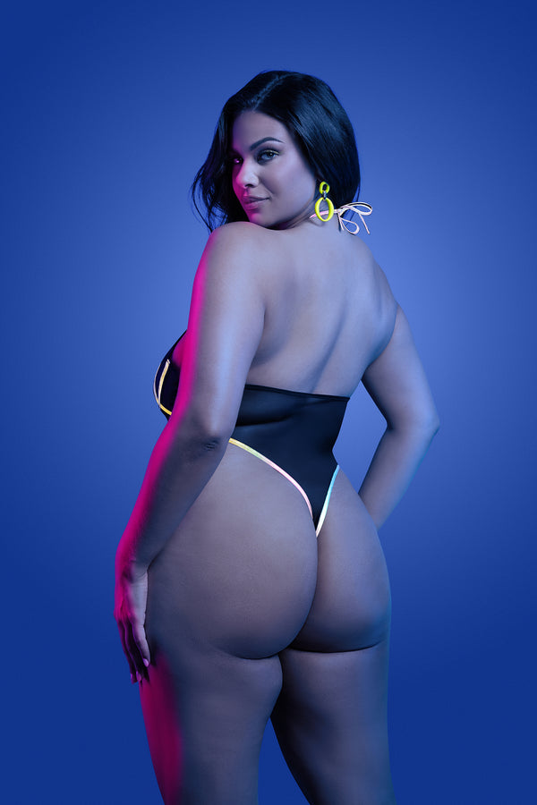 Black halter teddy with sheer mesh and rainbow reflective binding, featuring high-cut legs and thong back that glows under light.