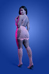 Plus Size Back view sexy pink UV reactive bodystocking dress with crisscross straps and mesh cut-outs