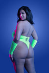 Plus Size Back View: Neon green halter teddy with UV glow effect, rhinestone details, and matching fingerless gloves, erotic lingerie bodystocking style.