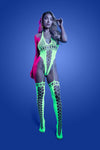 Front view: Neon green UV reactive halter teddy bodystocking with fishnet cutouts and attached stockings, model standing against blue background.