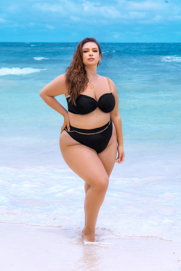 Two-piece swimsuit with twist detail top and high-waisted medium coverage bottom with removable chain belt accessory. Inclusive sizing for all body types. Stylish and on-trend design with removable chain straps and belt accessory.