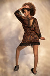 Wild Temptress: The Sassy Vixen's Luxurious Animal Print Robe Robe Unleash Your Inner Vixen with the Sultry Animal Print Robe