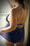 Navy sheer mesh babydoll with caged straps and matching panty.