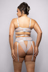 Silver embroidered bra set with rhinestone hardware, garter belt, and daring open back panty for a luminous, high-fashion lingerie look