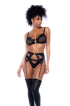 A three-piece lingerie set featuring an underwire top with adjustable straps, wet-look fabric, sheer mesh contrast, a matching thong, a garter belt, and ring details.

