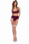  A three-piece lingerie set in rich hues featuring an eyelash lace top with underwire, adjustable straps, a matching garter belt, and thong for an elegant and luxurious look.