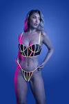 Black reflective lingerie set with underwire bra and strappy panty, featuring multicolor glow binding and sheer mesh panels.