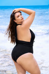 This stunning swimsuit features a plunging neckline and medium coverage bottom, with an interlocking lace-up waistband that accentuates your curves